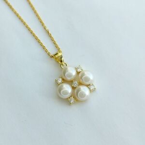 White cultured pearl pendant necklace with white Sapphire in 14k gold